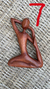 Hand-Carved Wooden Yoga Poses Art - Serene and Spiritual Home Decor