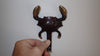 Brass crab hanger or hook for kitchen pots and pans